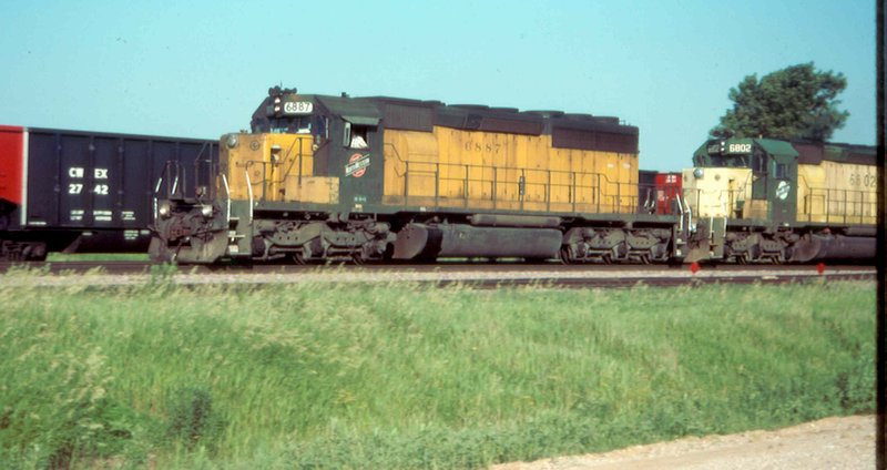SD40-2's pass a CWEX coal train